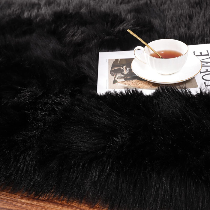 Everly Quinn Gulafsha Handmade Faux Sheepskin Black Rug & Reviews Wayfair